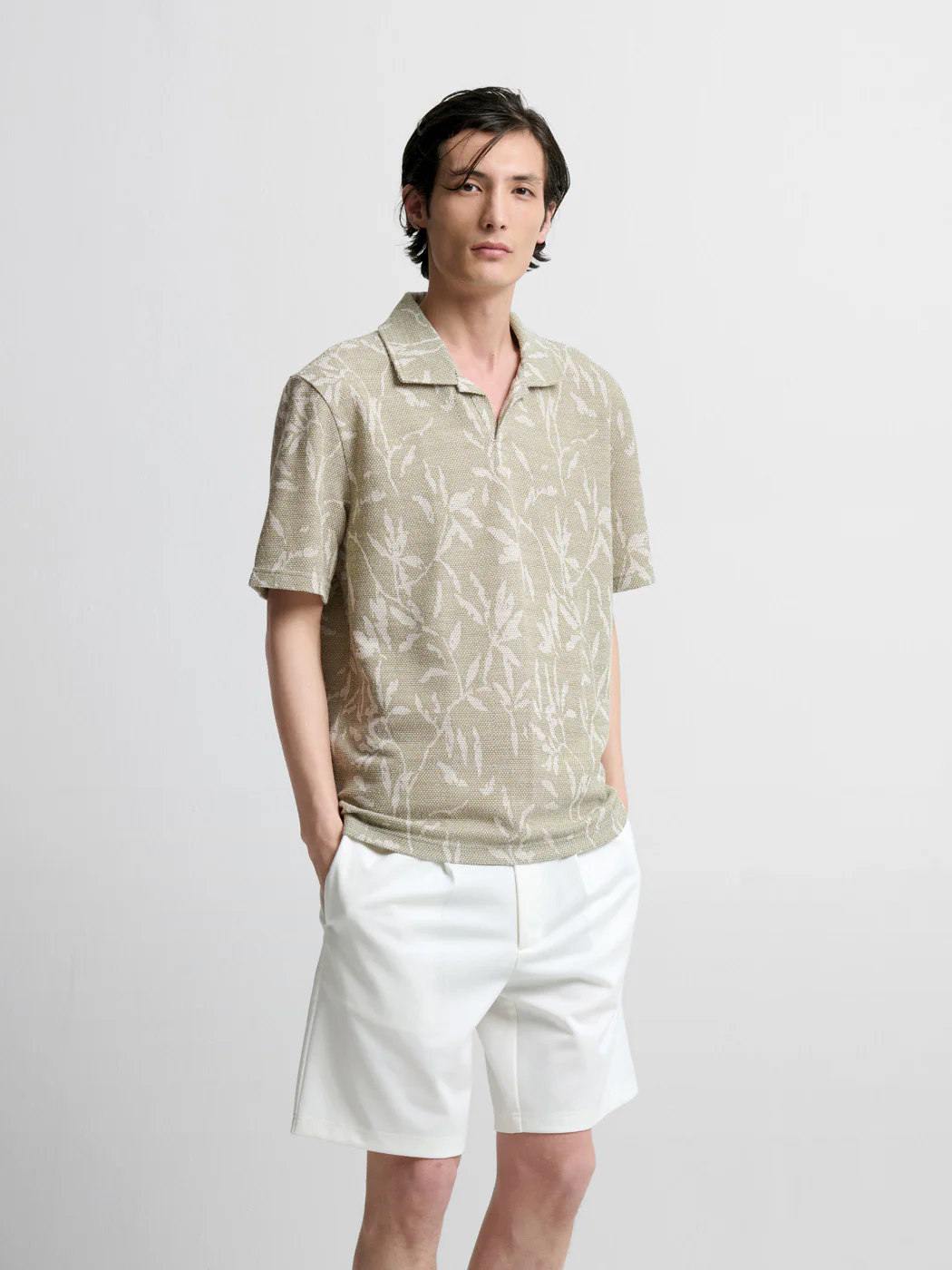 Polo col ouvert Ă motifs